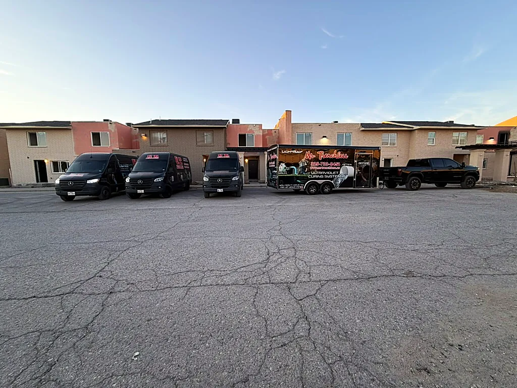 Commercial plumbing crew and equipment at a multifamily property in El Paso